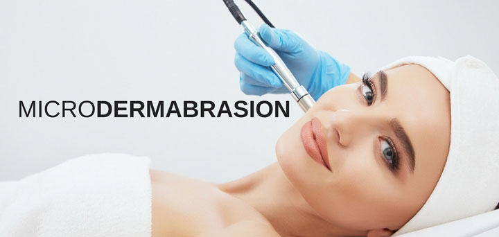woman receiving microdermabrasion treatment